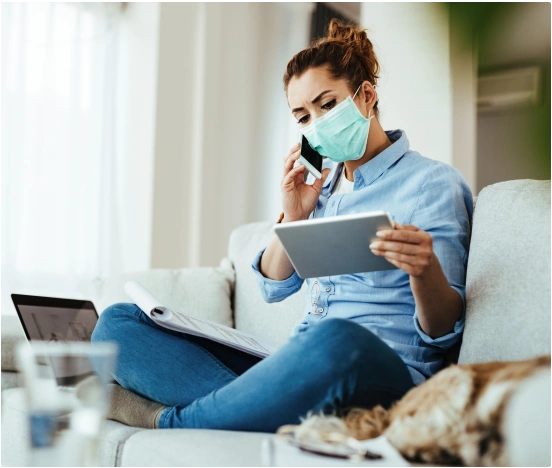 Two healthcare professionals reviewing notes